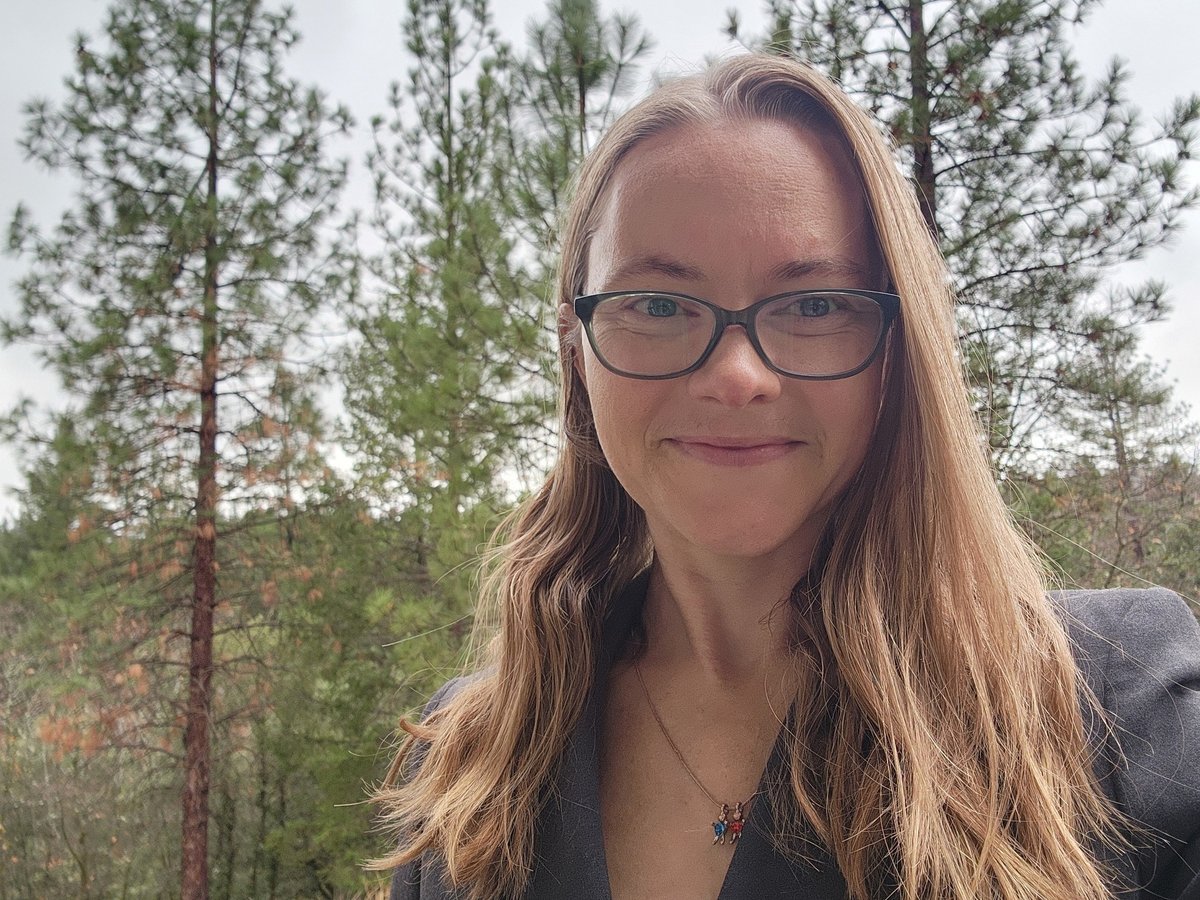 Katie Young, JD, attorney at Evergreen Oak Law, outside the family's Colfax property