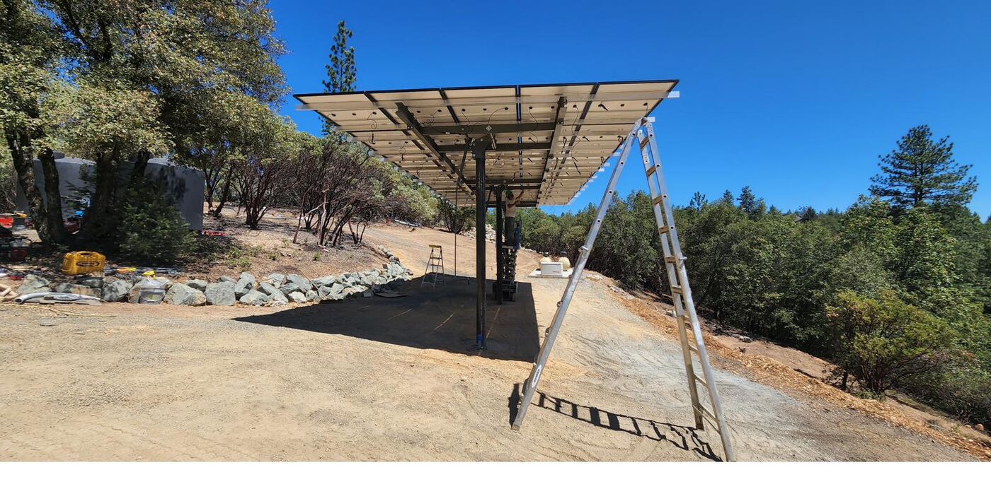 15 kilowatt tiltable ground-mount solar array being installed on the property