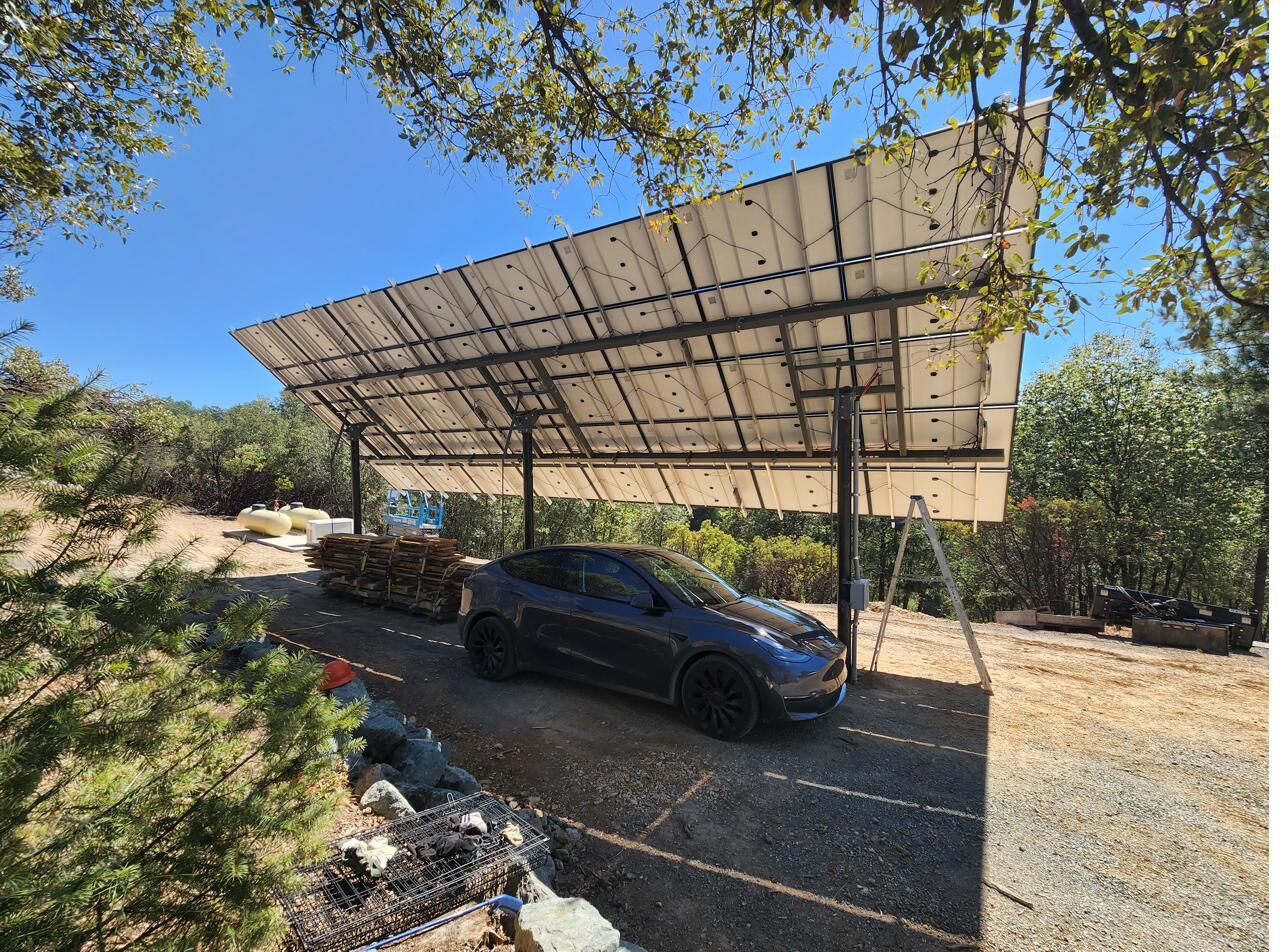 Electric vehicle charging off-grid under the tiltable solar carport