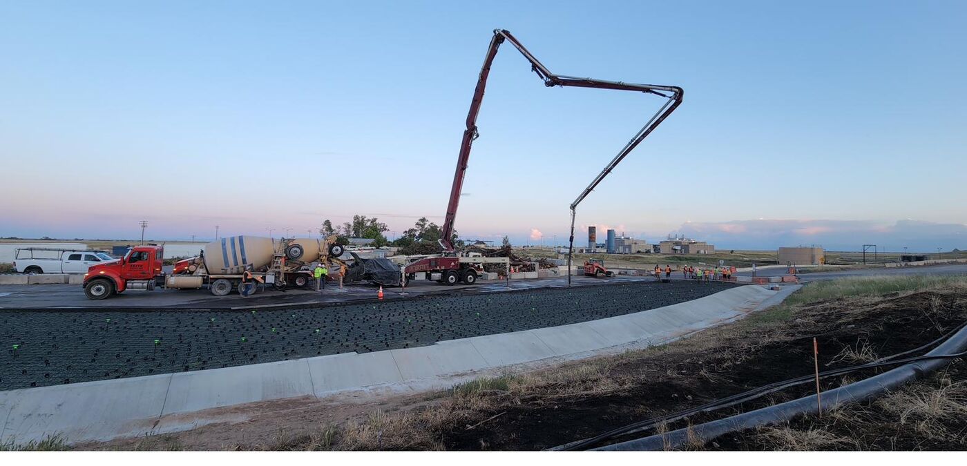 Dawn concrete pour with pump truck on the 12,000 sqft Kiefer Landfill slab